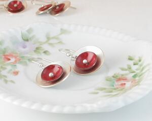 photo of Dangle Earrings, 1/2" red copper enamel disc joined with a 3/4" brushed-finish silverplate disc, hanging from argentium 935 sterling silver earwires, shown with dime for size reference